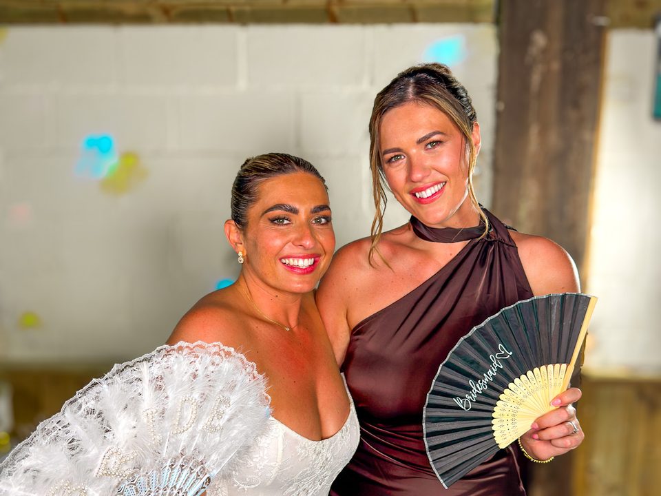 Bride and bridesmaid at the Party Octopus 360 photo booth, Clapham Holme Farm, Great Hatfield